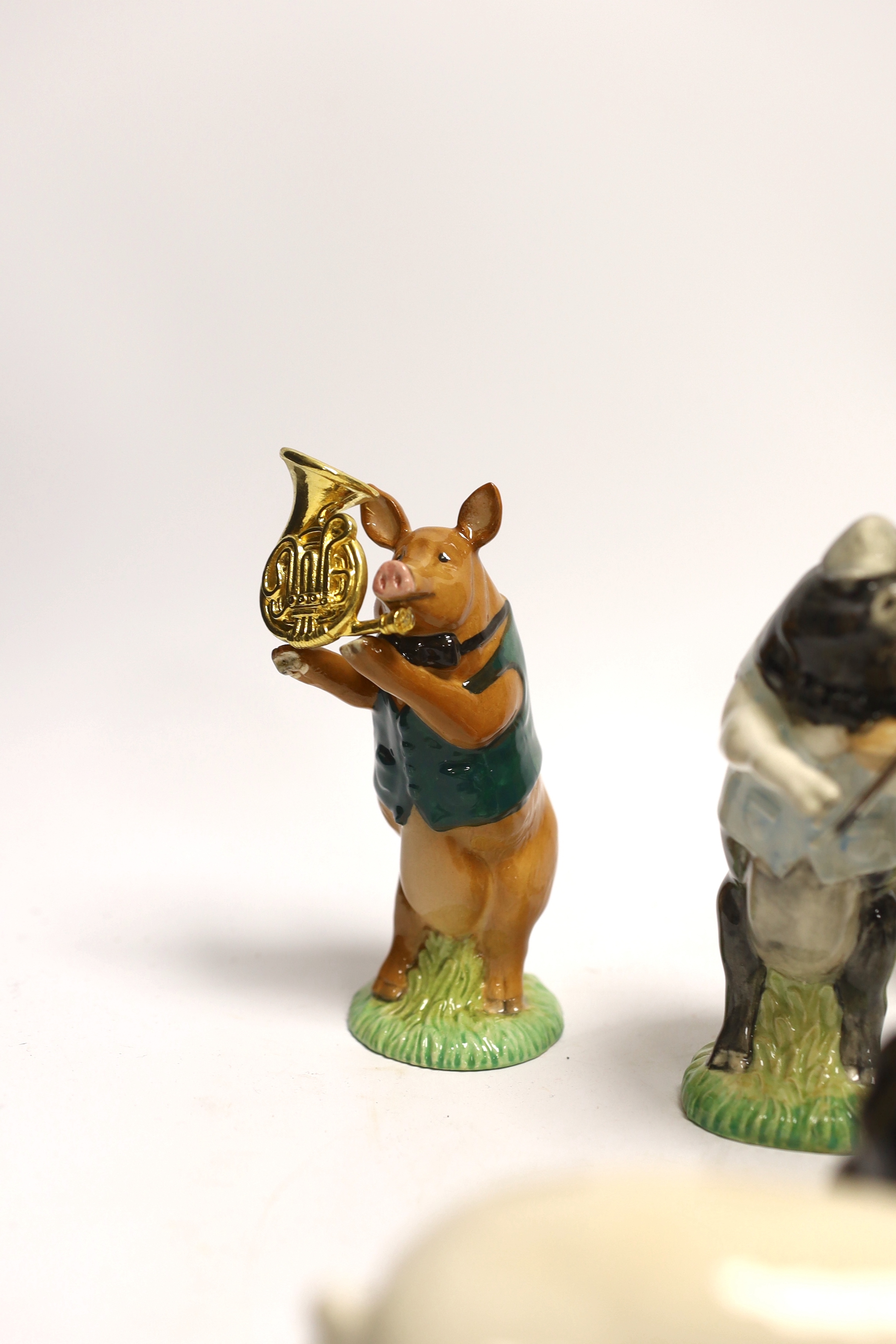 Five Beswick pigs and ten Beswick pig musician band figures